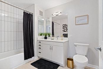 Oversized soaking tub in bath